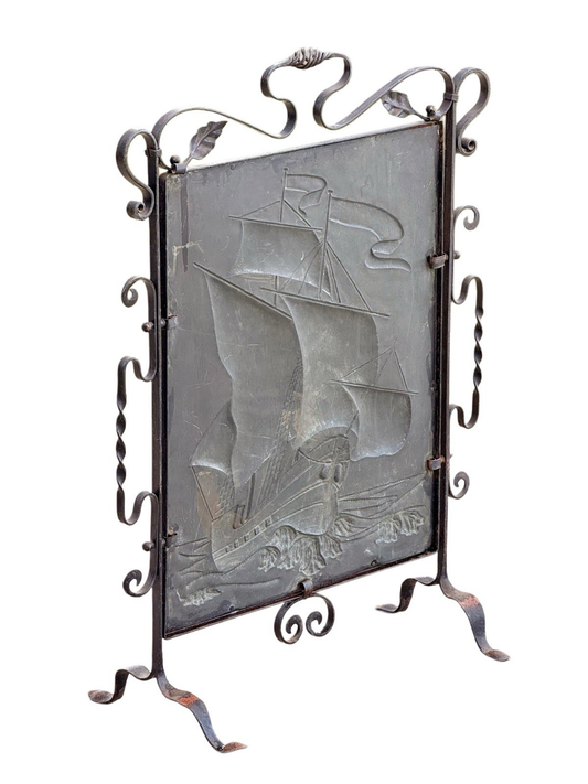 Back of the Arts & Crafts fire screen showing reverse of the copper galleon panel