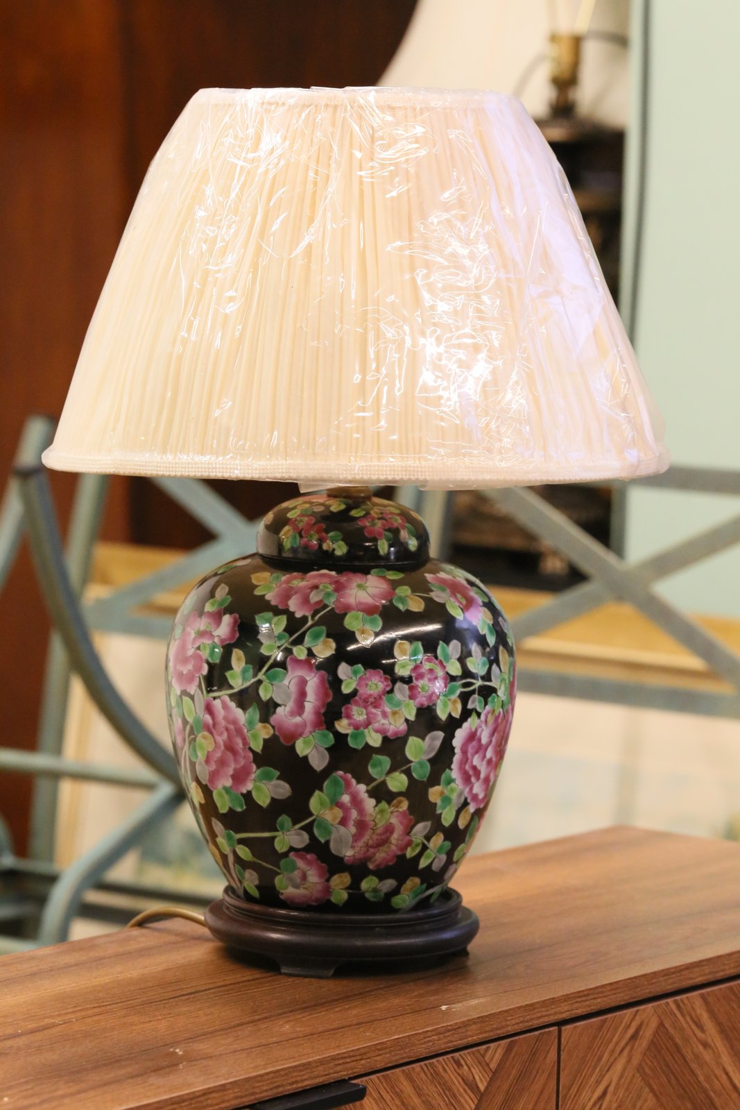 Chinese porcelain floral table lamp with shade, three-quarter room view
