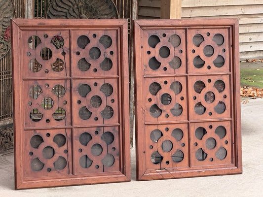 Pair of carved pine quatrefoil panels, front view