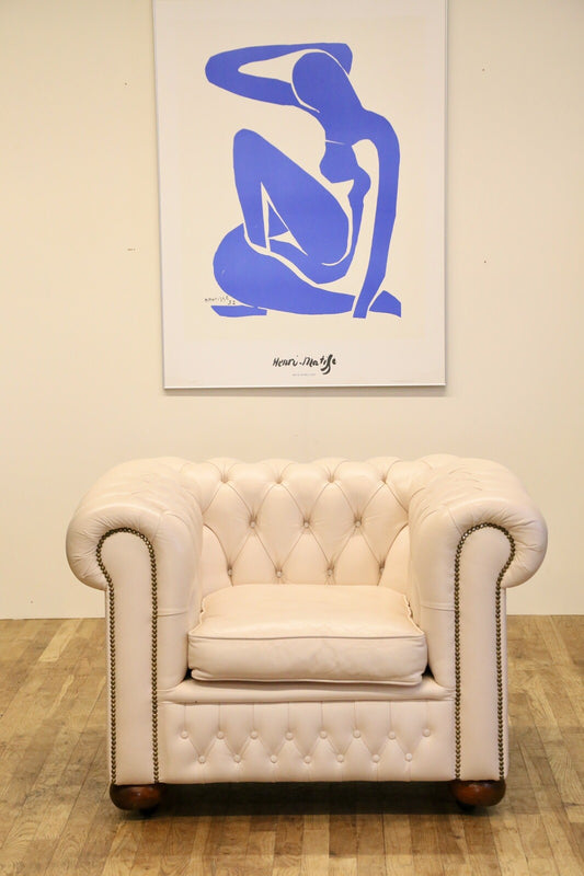 Cream leather Chesterfield club armchair, front view