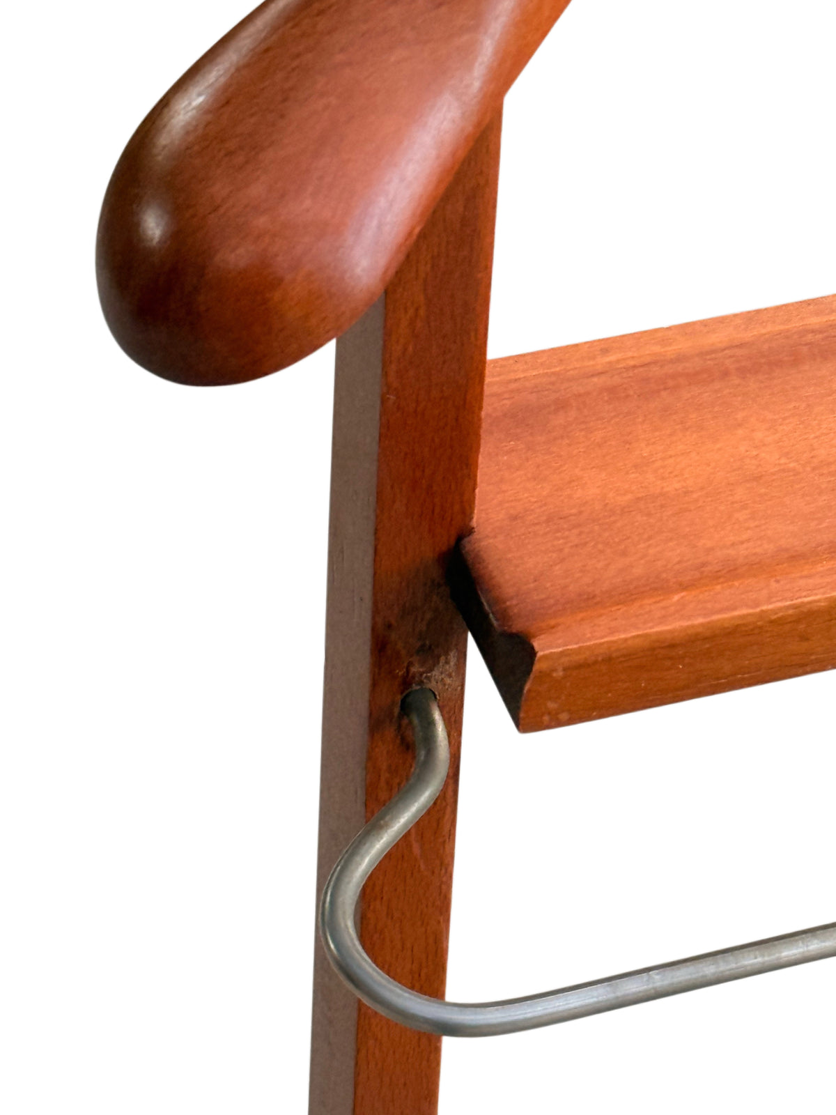 Close-up of the trouser bar pivot showing a dark mark on one upright