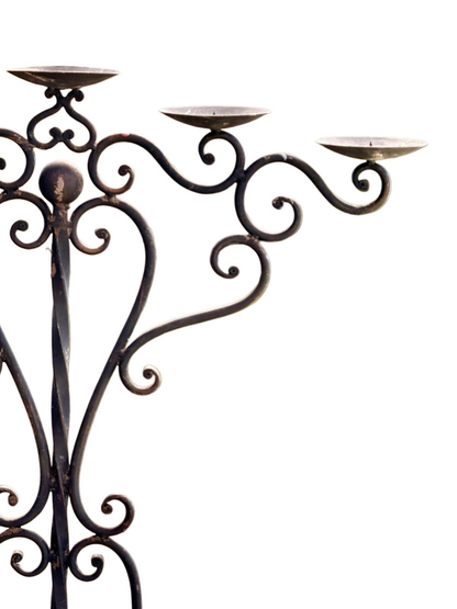 Wrought iron candelabra, close-up of scrolled arms, right side
