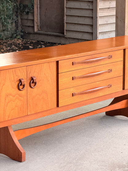 Beautility Teak Sideboard, Mid-Century Masterpiece with Sculptural Trestle Base, 1960s British Craftsmanship