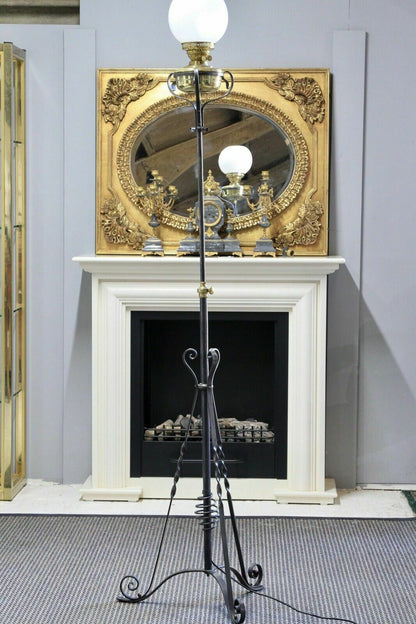 Arts & Crafts wrought iron and brass standard lamp, lowered position, full view