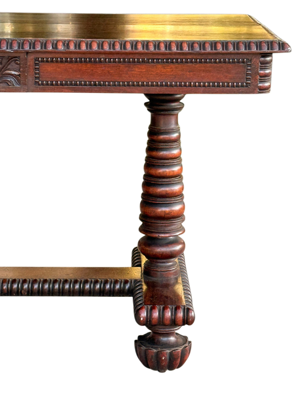 Opposite end of the rosewood library table showing the turned column and gadrooned platform base
