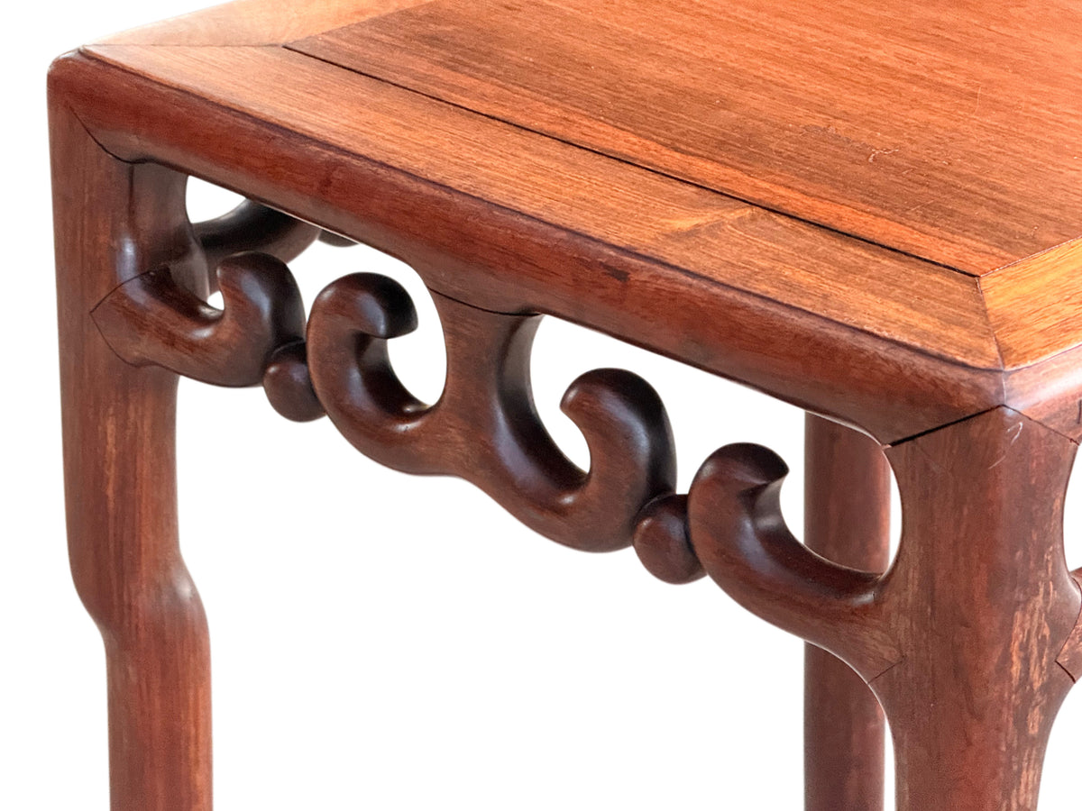 Corner detail of the carved apron and moulded top edge