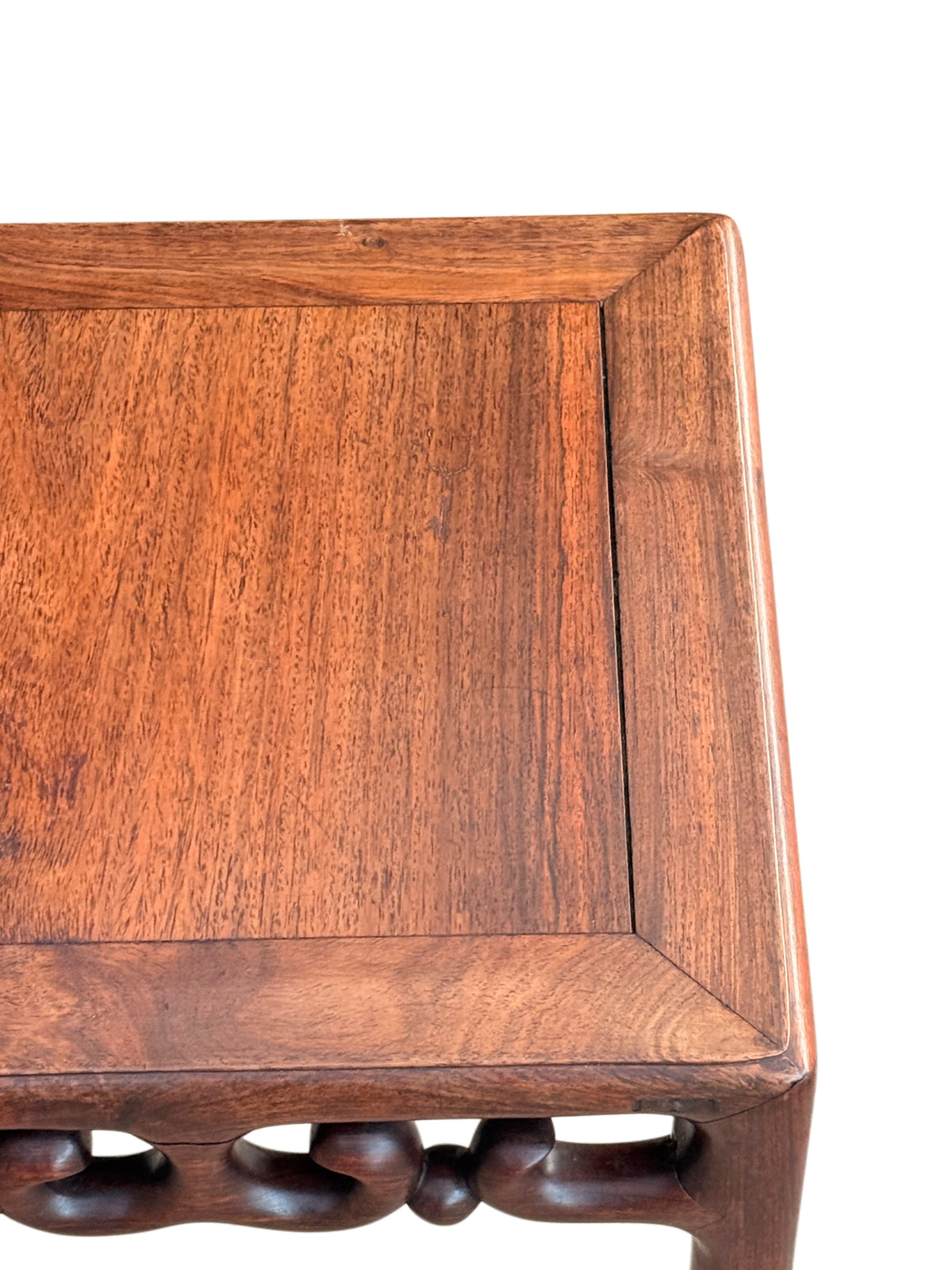Rosewood top with inset floating panel and surface wear