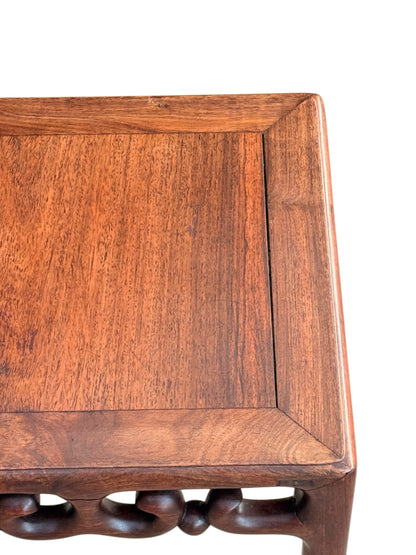 Rosewood top with inset floating panel and surface wear