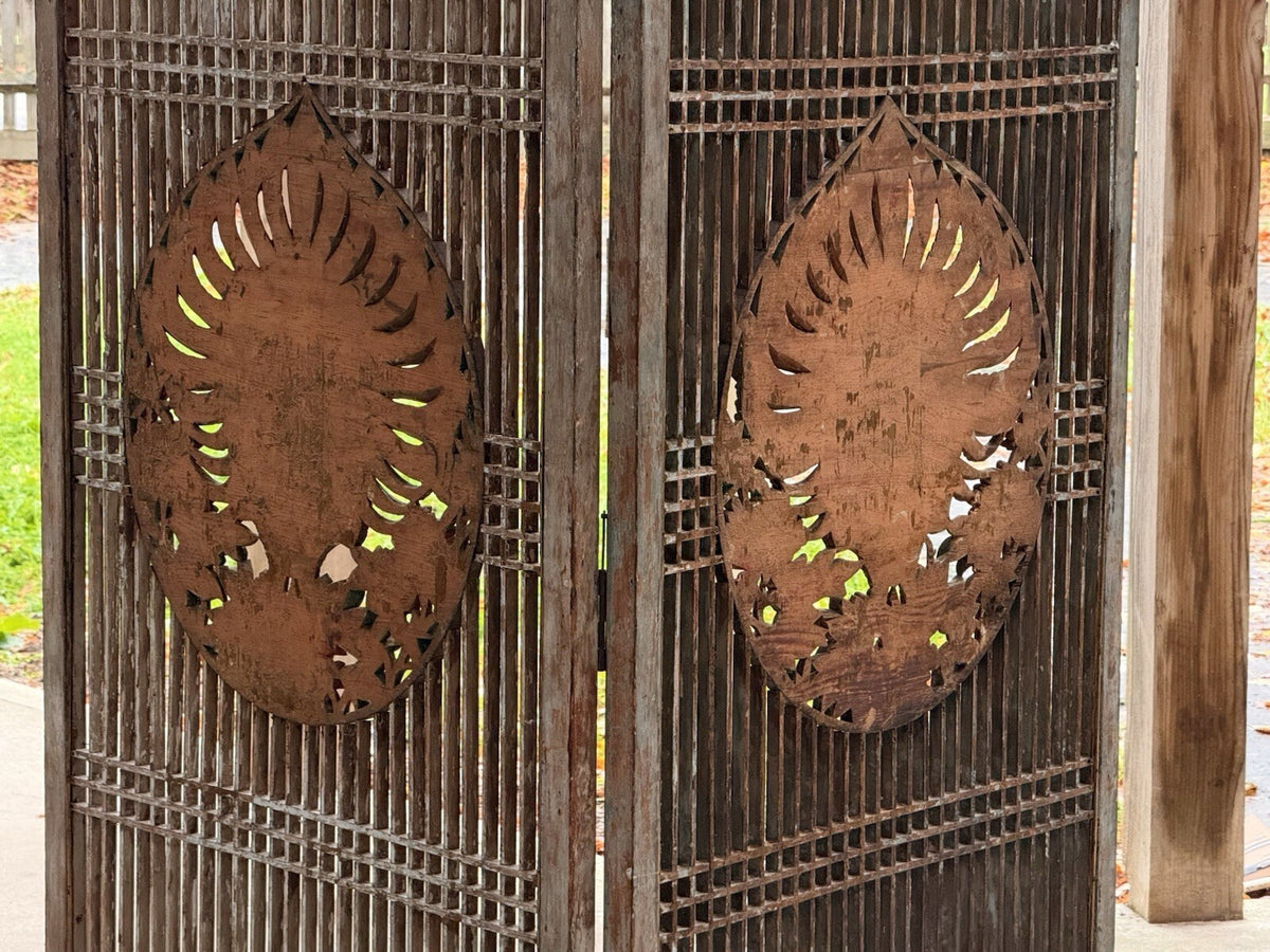 Reverse of both carved medallions on the two-panel screen