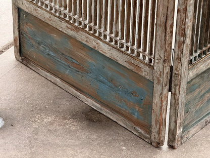 Reverse of lattice screen, blue painted base panels and hinge