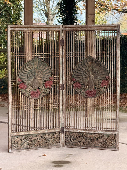 Antique two-panel lattice screen with carved peacock medallions, red flowers and carved wave base panels