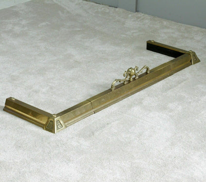 French antique brass fireplace fender, three-quarter view