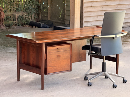 Danish rosewood desk by Arne Vodder with grey office chair