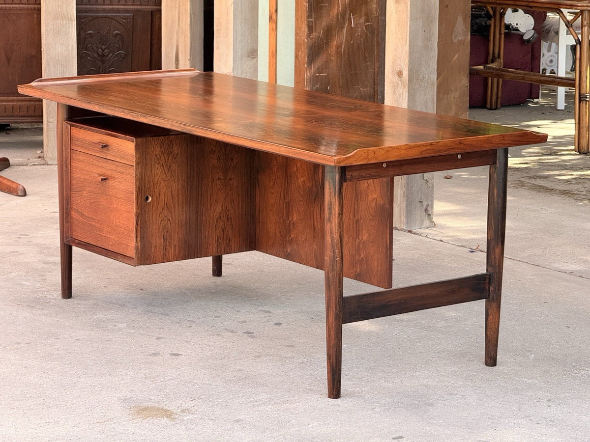 Back view of the Arne Vodder Sibast rosewood desk showing finished kneehole