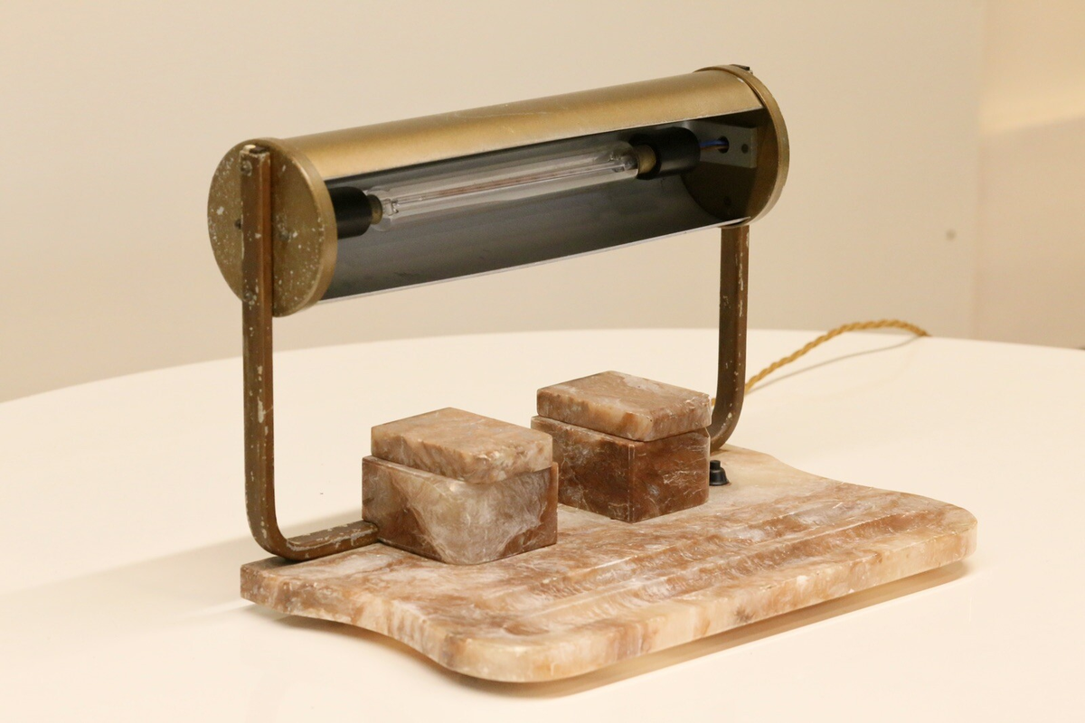 Art Deco brass desk lamp, view of tube shade underside and inkwells