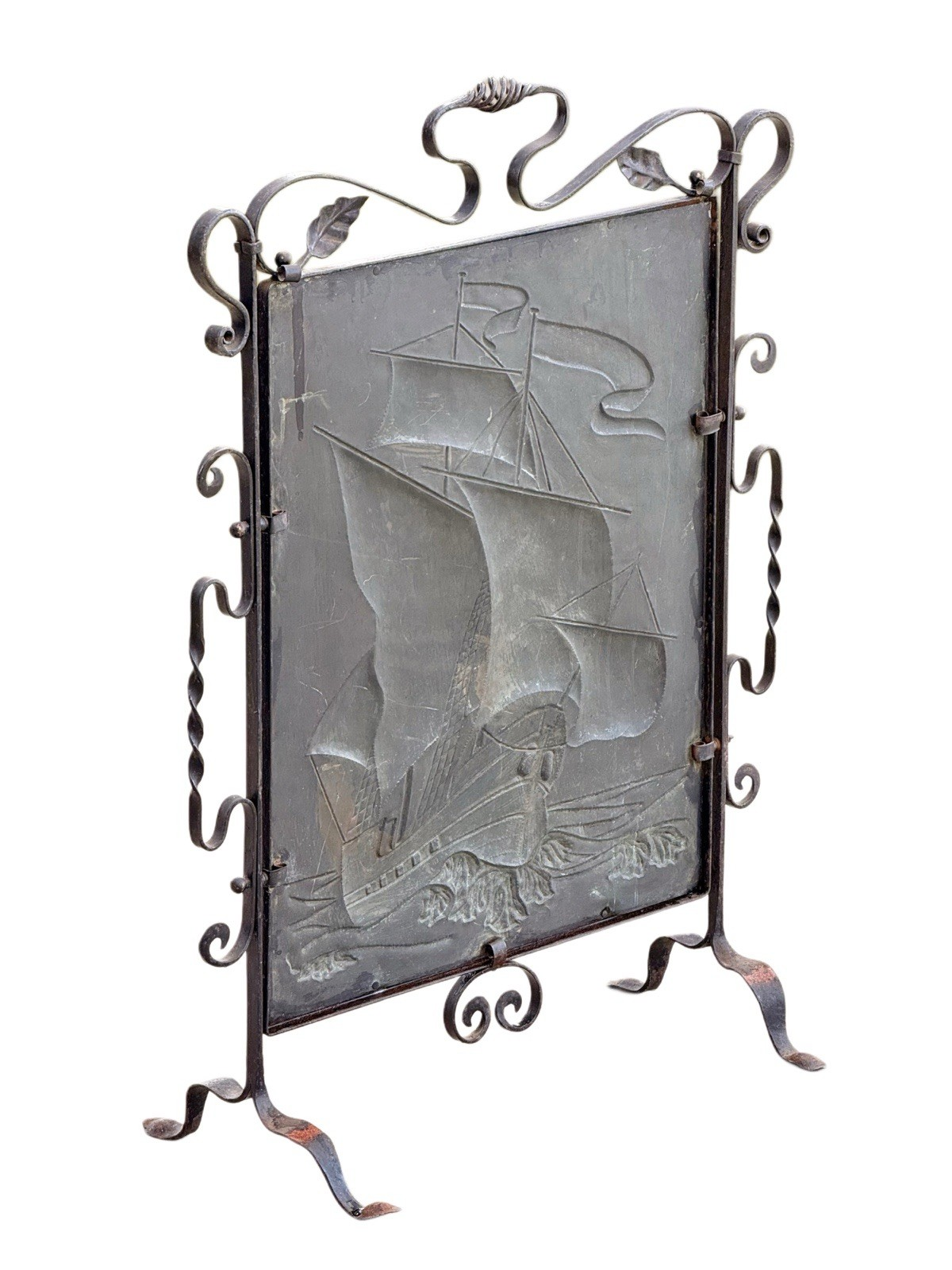 Back of the Arts & Crafts fire screen showing reverse of the copper galleon panel