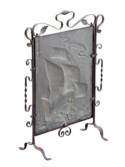 Back of the Arts & Crafts fire screen showing reverse of the copper galleon panel
