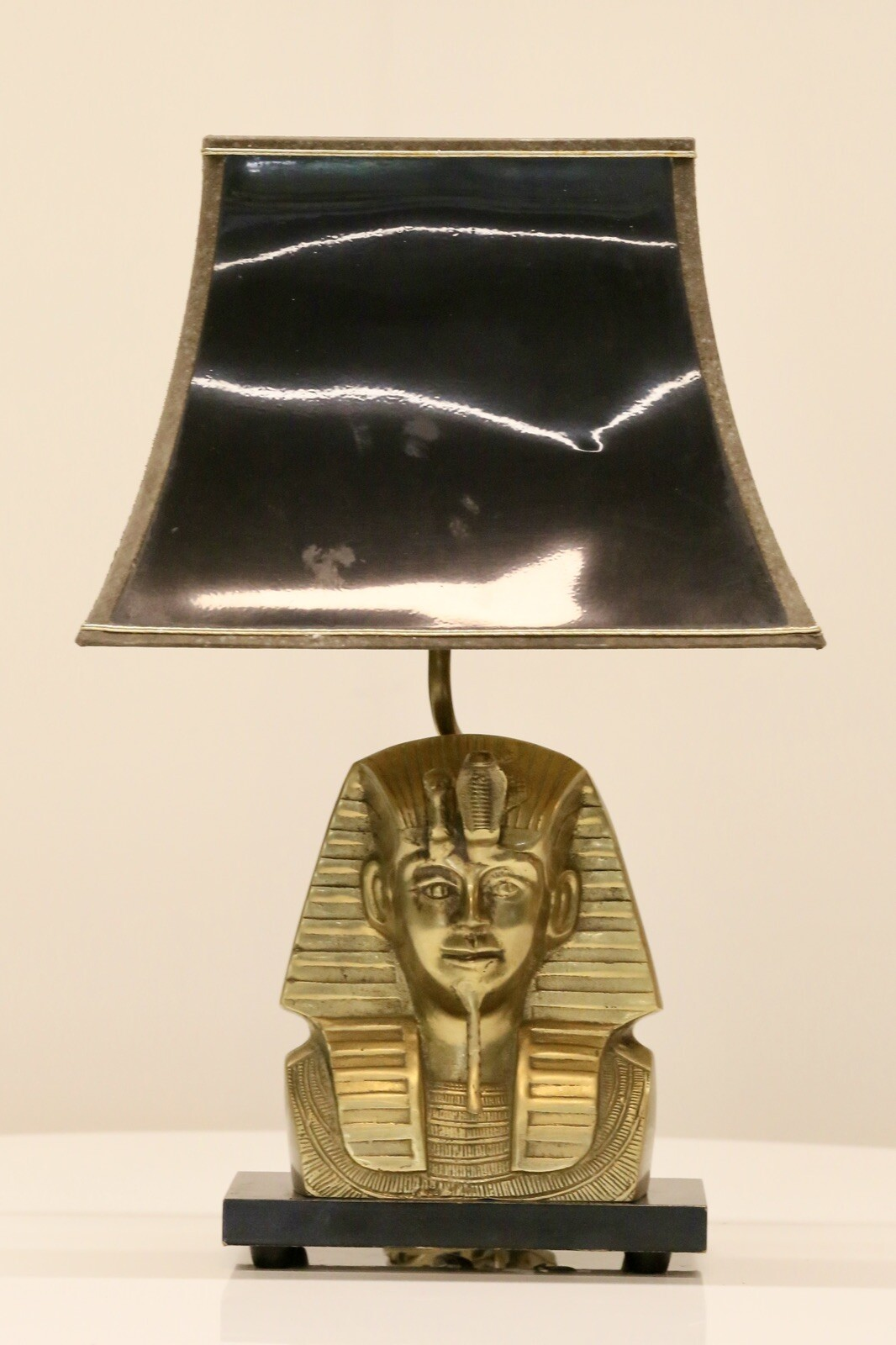 Brass pharaoh table lamp with black shade, full front view