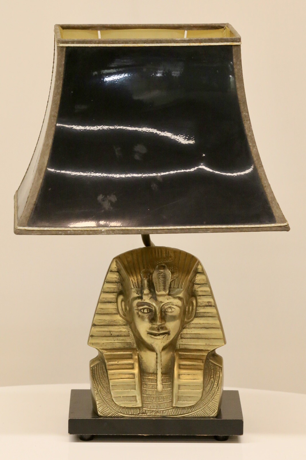 Hollywood Regency brass pharaoh table lamp, three-quarter view