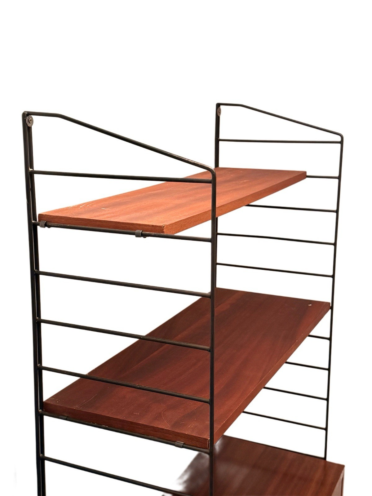 Brianco wall unit, detail of angled teak shelves on metal ladders