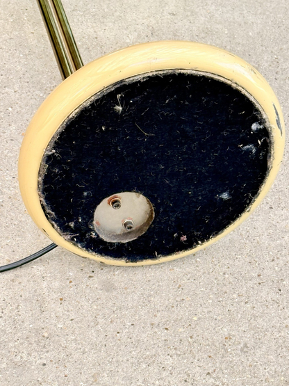 Underside of the Piantana lamp base showing felt pad