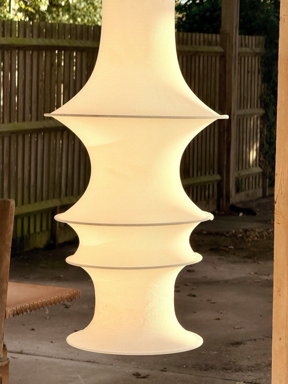 Close-up of the lower tiers of the white fabric Falkland shade