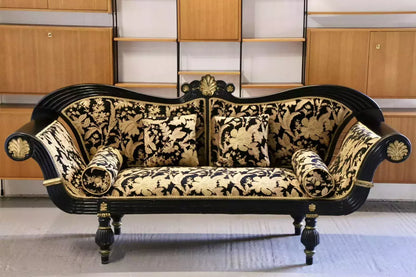 Empire Regency ebonised double-ended couch, front view in a room