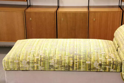 Close-up of Osborne & Little fabric seat on the Relyon ottoman