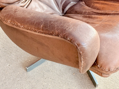 Close-up of whipstitched leather arm, De Sede S231