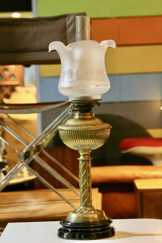 Victorian Art Nouveau brass oil lamp, three-quarter view