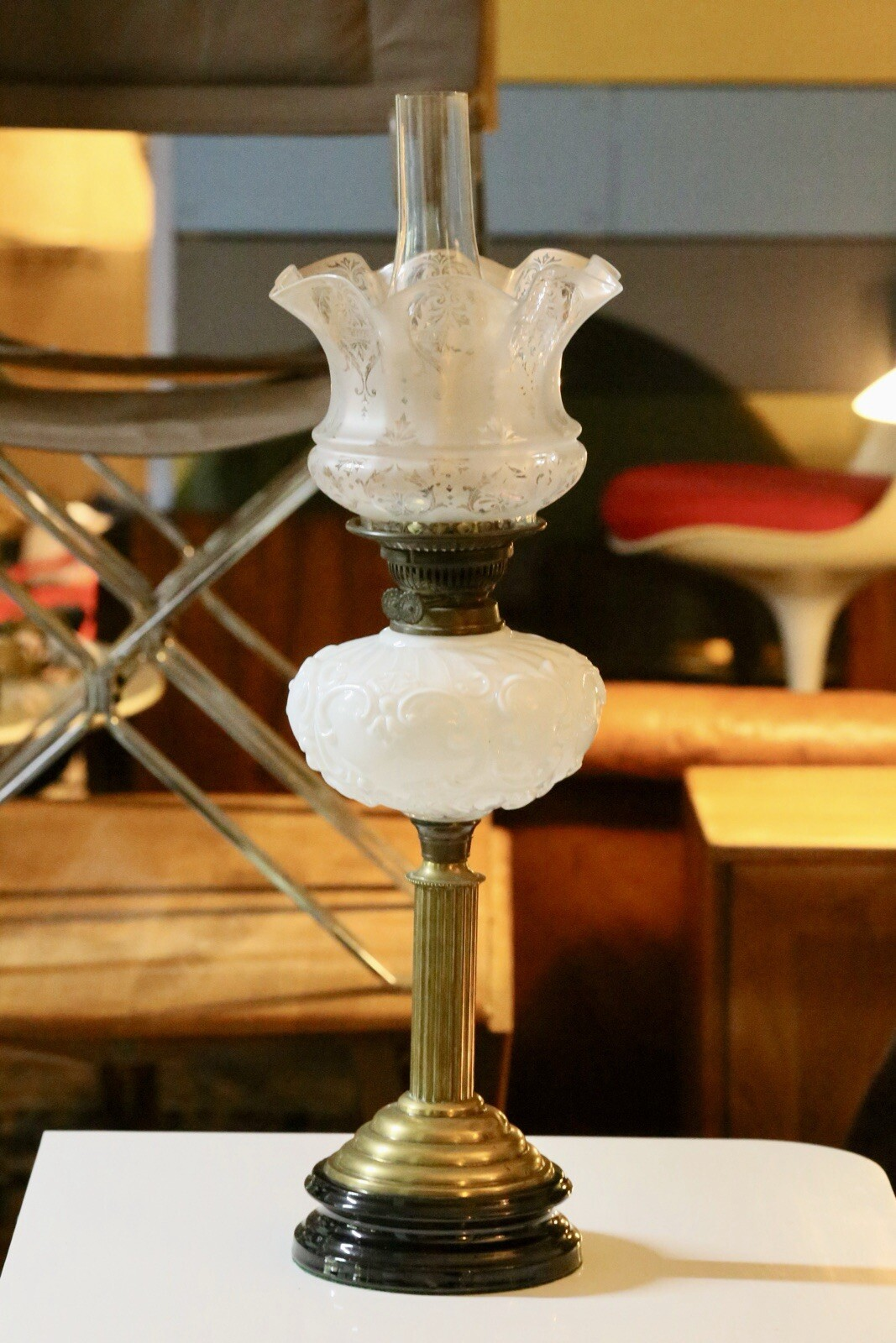 Victorian brass oil lamp with milk glass reservoir, full view