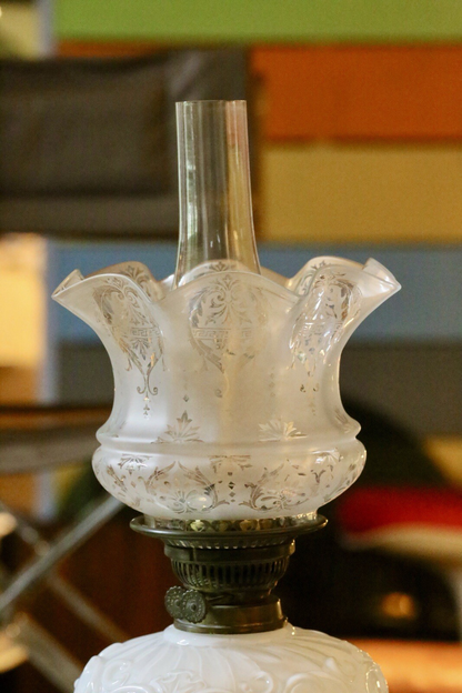 Close-up of etched frosted glass tulip shade