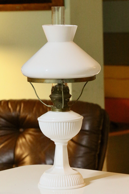 Art Deco brass and milk glass oil lamp, front view