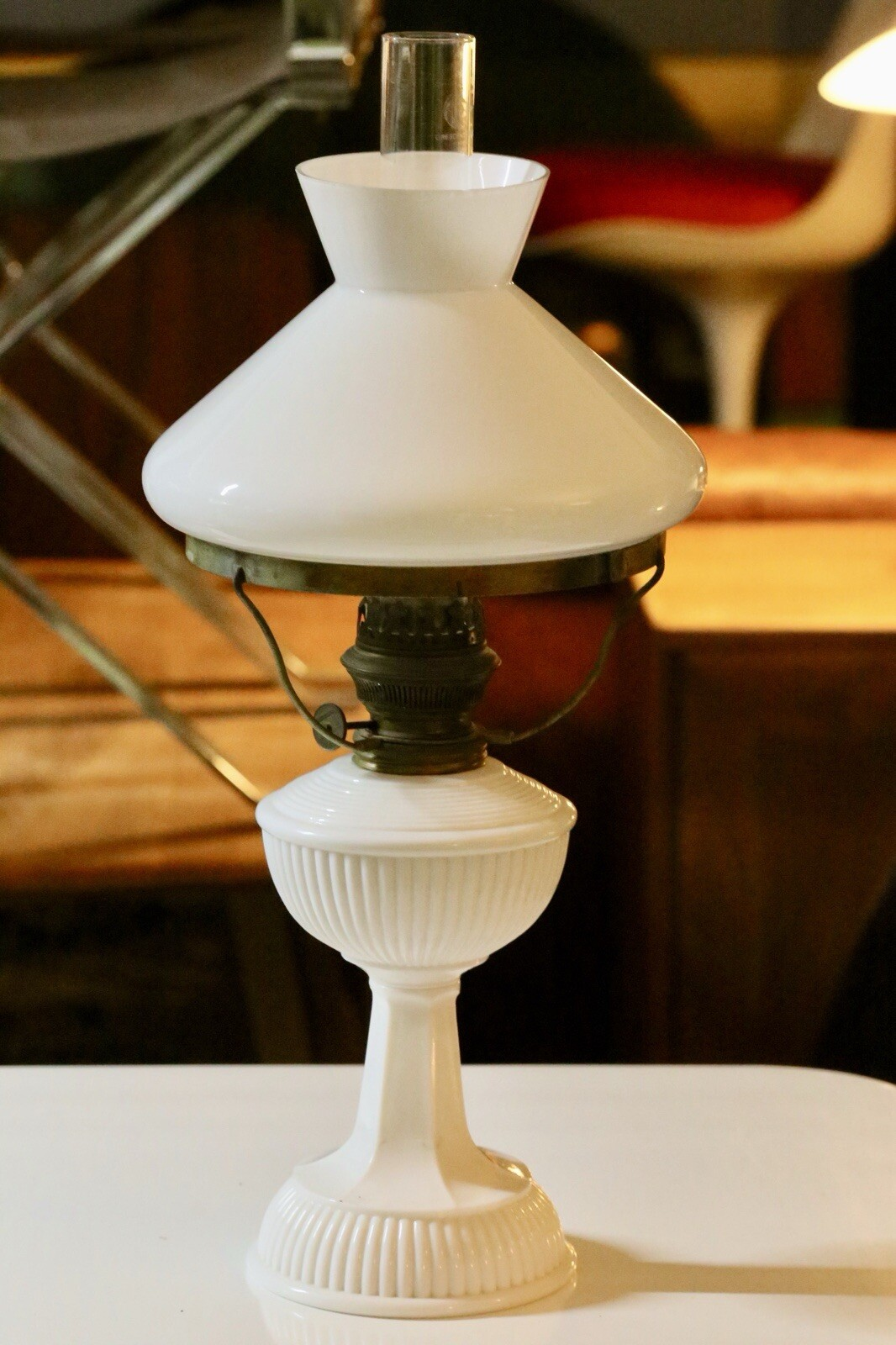 Art Deco brass and milk glass oil lamp, side view
