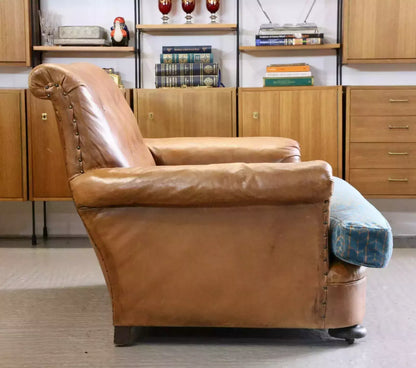 French Art Deco style brown leather loveseat armchair, side view