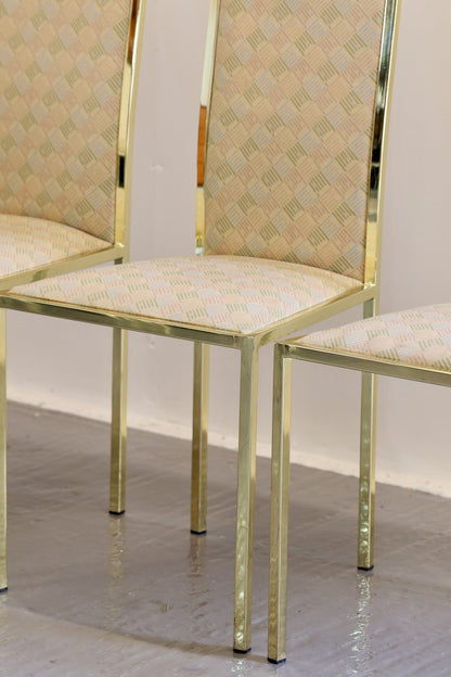 Close-up of gilt frame and upholstered seat, Renato Zevi dining chairs