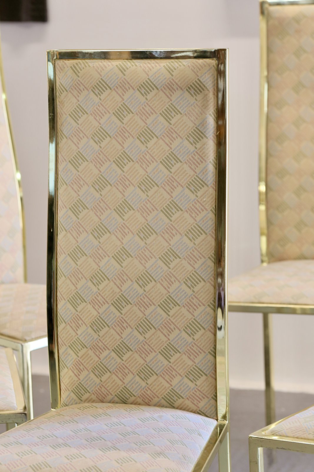 Close-up of tall patterned upholstered back, Renato Zevi chair