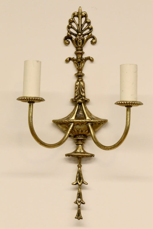 French Empire gilt brass double sconce with anthemion crest, urn body, scrolled arms and drop finial, H65cm