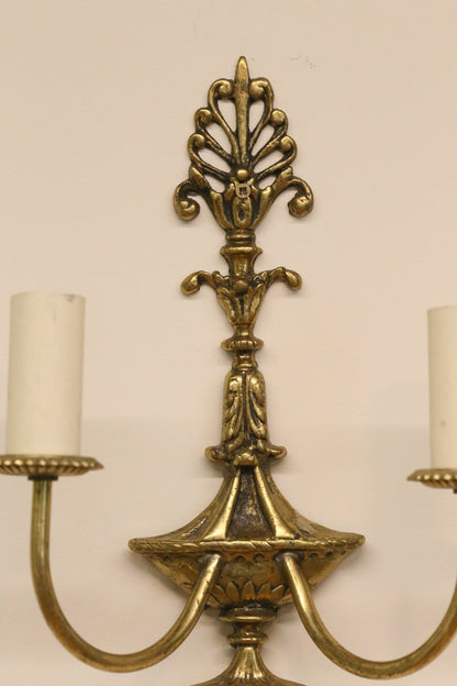 Close-up of anthemion crest on the French Empire gilt sconce