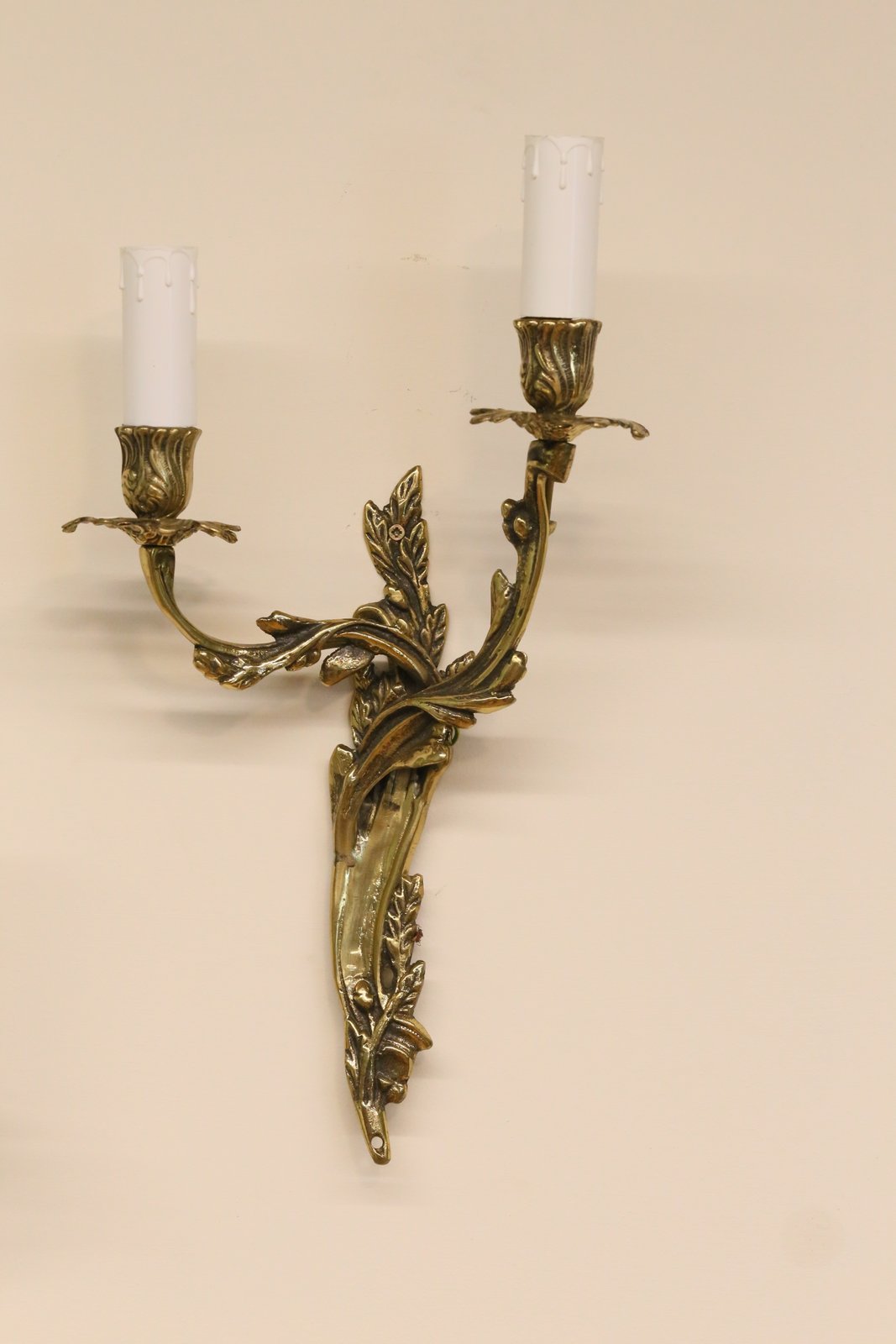 French Louis XV style gilt brass two-arm wall sconce, side view