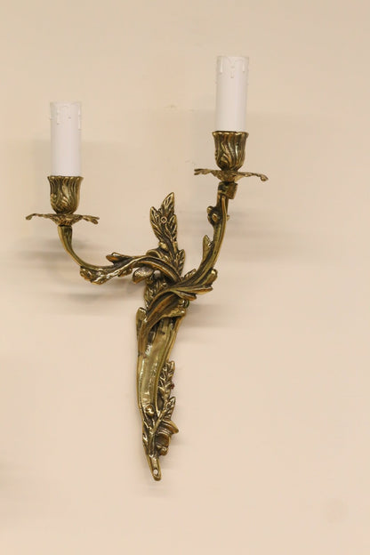 French Louis XV style gilt brass two-arm wall sconce, side view