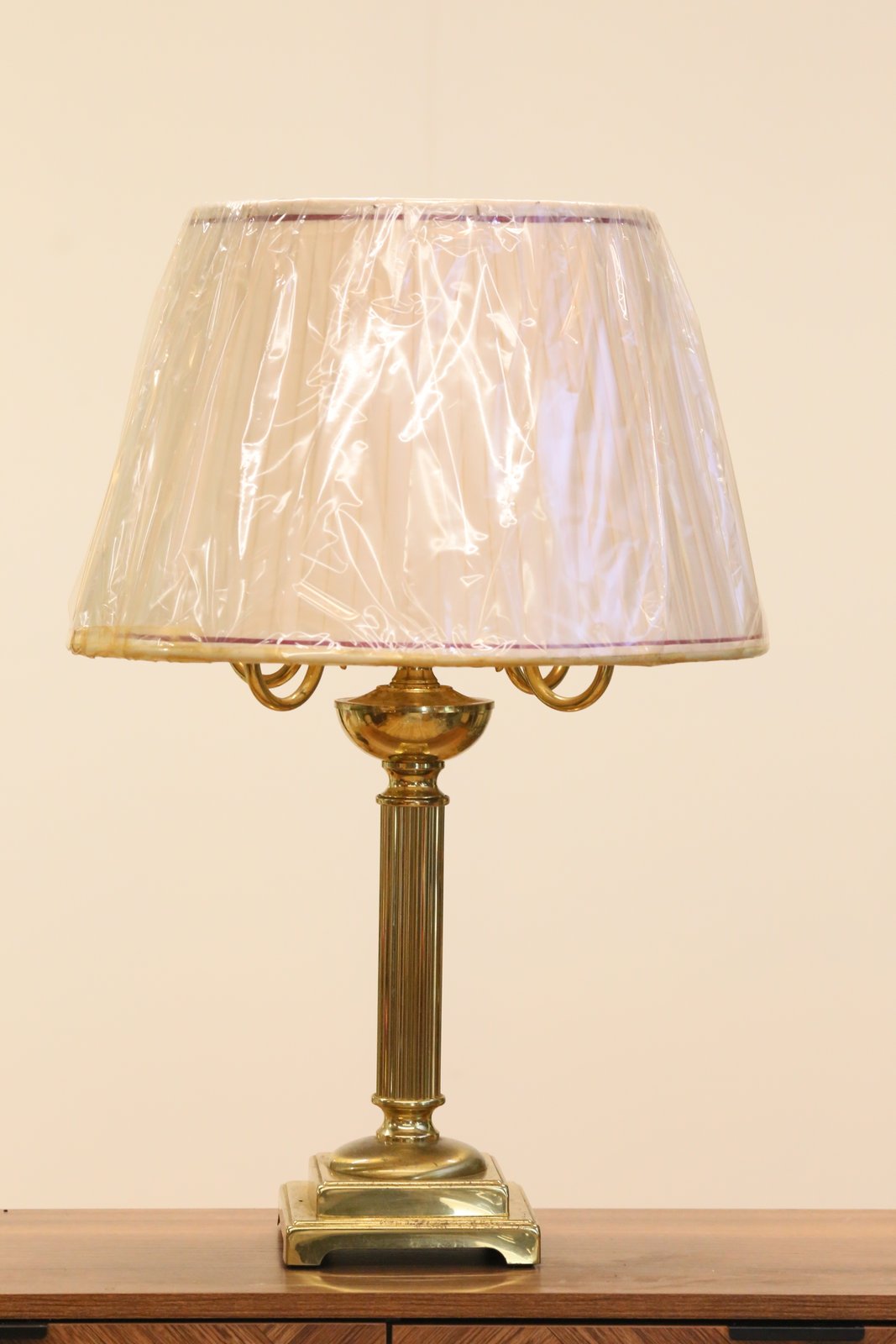 Vintage brass candelabrum table lamp with pleated shade, front view