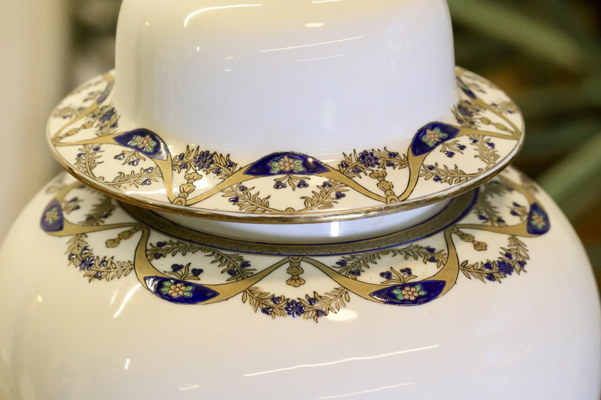 Close-up of blue and gilt scalloped border on the Chinese porcelain lamp shoulder