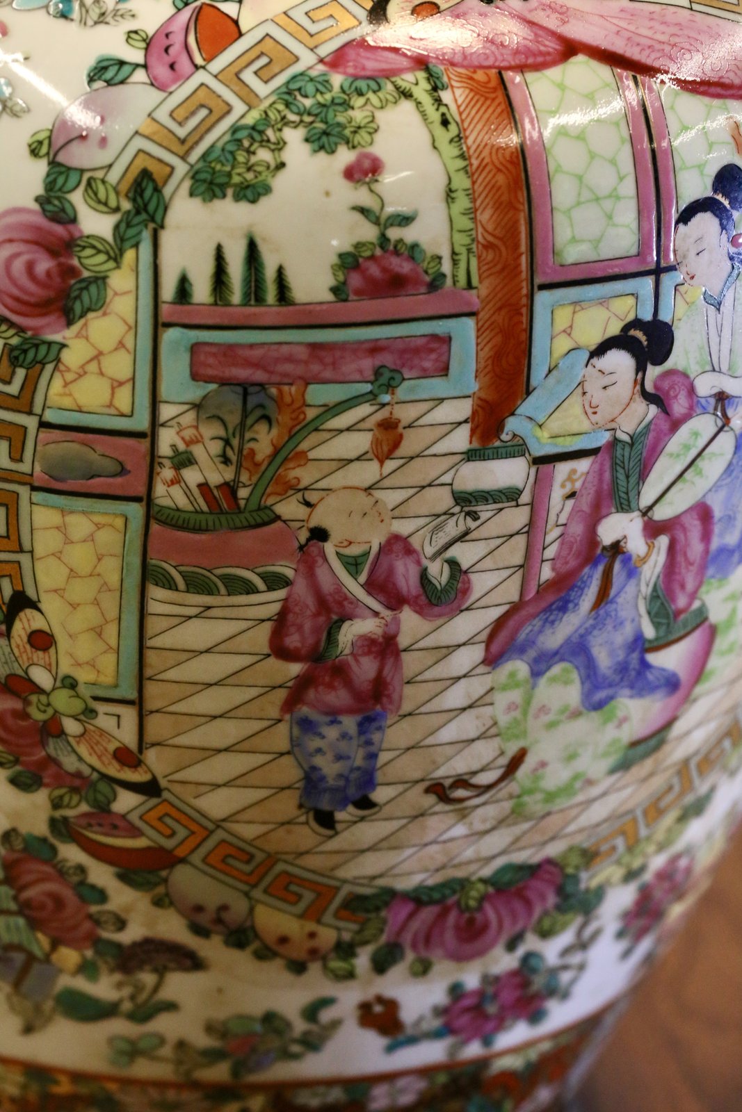 Close-up of hand-painted court scene with figures, famille rose porcelain