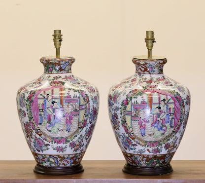 Pair of Chinese famille rose porcelain lamp bases, front view