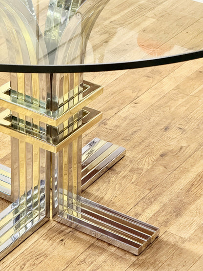 Close-up of brass collars and cross base, Hollywood Regency table