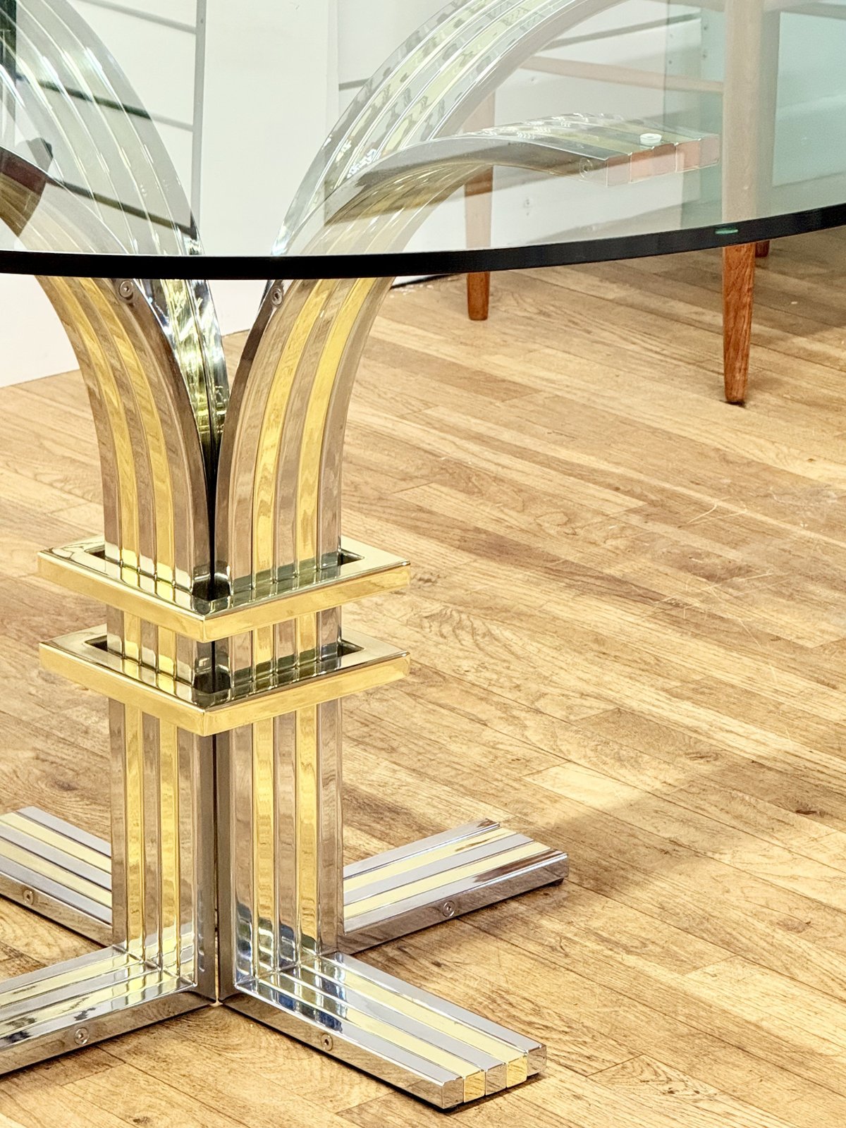 Close-up of flared pedestal and brass collars, side view
