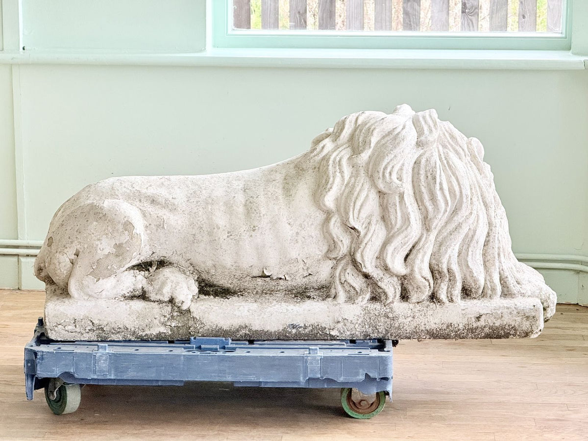 Cast stone lion after Canova, full side profile on dolly