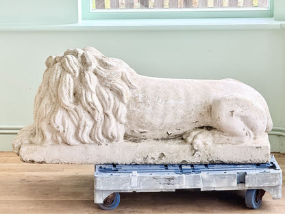 Cast stone lion after Canova, side view showing tail and paws