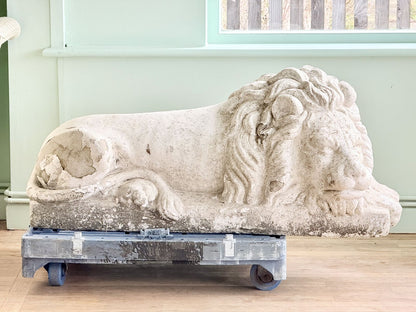 Cast stone lion after Canova, full length side view on dolly